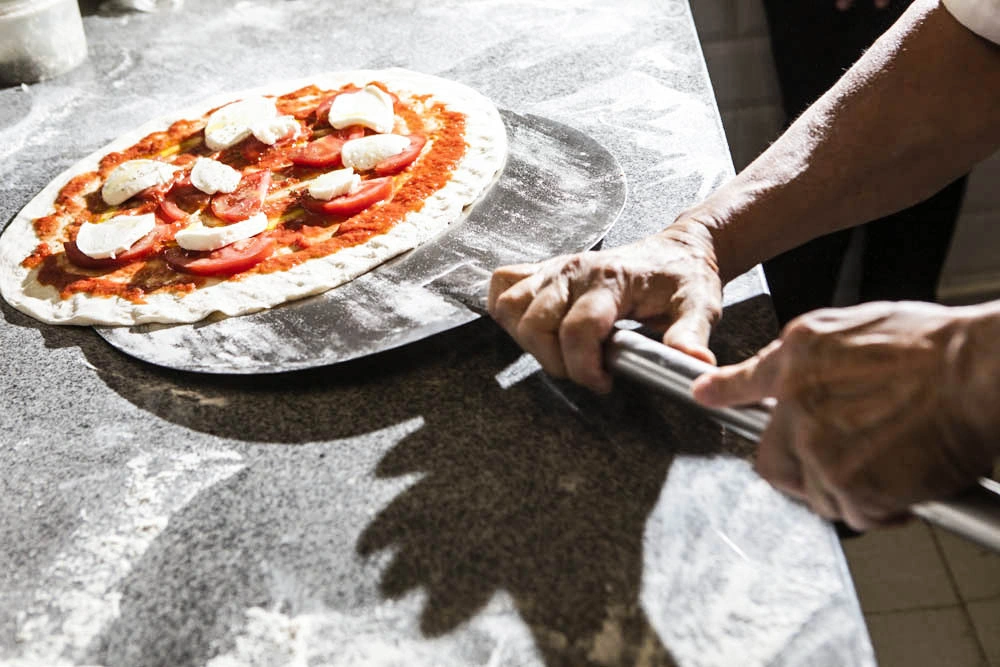 Handmade authentic Italian Pizza at Pizzeria Italia